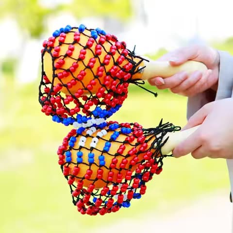 Maracas en perles colorées de scène